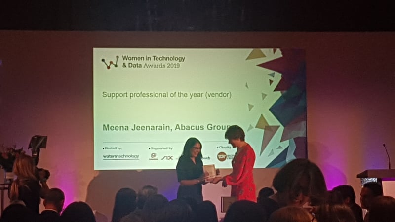 Meena Jeenarain accepting Women in Tech award at WatersTechnology luncheon in London